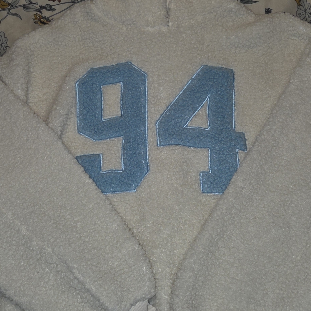 No Boundaries Cream Sherpa Hoodie with Blue Numbers